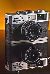 Image result for Old Olympus Fixed Lens Film Camera