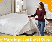 Image result for How to Put Duvet Cover On Comforter