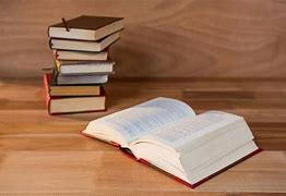 Image result for Book On a Table