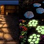 Image result for Glow in the Dark Garden Stones