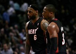 Image result for Miami Heat Photo of the Year LeBron and Dyane Wade