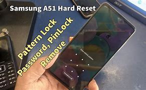 Image result for Cell Phone Hard Reset Pin