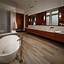 Image result for stone bathroom floors install
