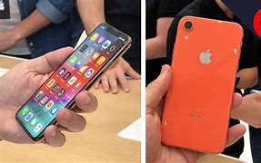 Image result for iPhone XS Max in Hand vs Xr