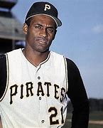 Image result for Roberto Clemente Hitiing Baseball