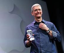 Image result for Tim Cook Shows Off iPhone
