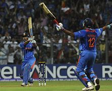 Image result for MS Dhoni and Sakshi World Cup 2011 Photo
