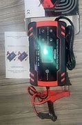 Image result for Mini Universal Battery Charger