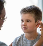 Image result for Person with Hearing Aid