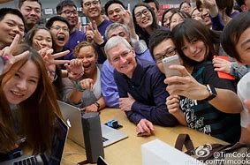 Image result for Tim Cook Apple Red China Logo