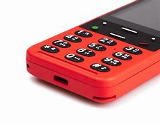 Image result for Red Cell Phone On a Table