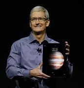 Image result for Tim Cook iPad 4