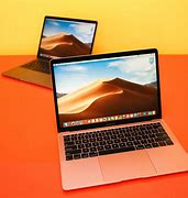 Image result for Apple iPhone and MacBook