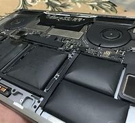Image result for Swollen Apple MacBook Pro Battery