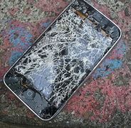 Image result for An iPhone 14 Pro Crack across Bottom