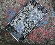 Image result for Broken iPhone 11 Pro in Blue