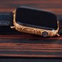 Image result for Black Apple Watch with Gold Band
