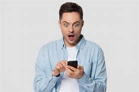 Image result for Confused Young Man Looking at a Phone