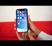 Image result for iPhone XR in Hand