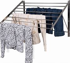 Image result for Indoor Wall Mount Foldable Laundry Drying Rack