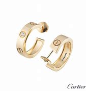 Image result for Gold Earbuds Cartier