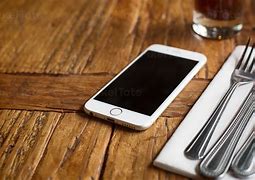 Image result for Phone Flat On Table