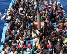 Image result for Migrants in Boat Italy