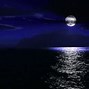 Image result for Beach at Night with Moon and Stars