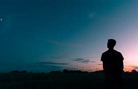 Image result for Man Looking Up in the Dark Sky