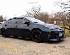 Image result for Toyota Corolla 2018 SE Customized Black and Pink