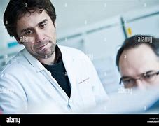 Image result for Scientist Looking at Data