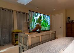 Image result for Foot of Bed TV Lift Cabinet