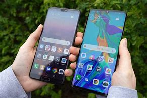 Image result for iPhone 8 Plus vs Huawei P30