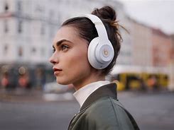 Image result for Silver Beats Headphones On People