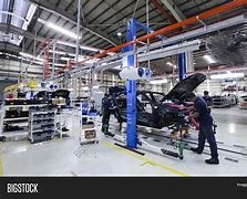 Image result for Auto Assembly Line Workers Group Photo