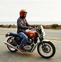 Image result for Royal Enfield Interceptor 650 with a Man