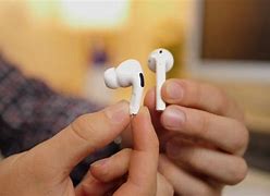 Image result for People with Air Pods Working