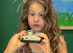 Image result for Kid Filming with iPhone with Shocked Face