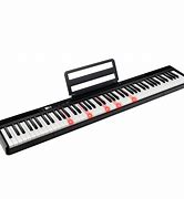 Image result for Kids White Piano Keyboard with Light Up Keys 90s