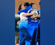 Image result for Harbhajan Nita Ambani Hugging Moment