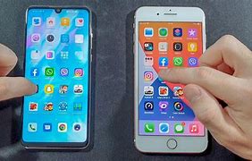 Image result for Huawei P30 Lite vs iPhone 7 Plus