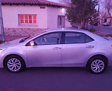 Image result for White Toyota Corolla