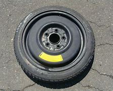 Image result for 2003 Mazda MPV Spare Tire