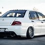 Image result for Lancer Evo 7 Yellow GSR