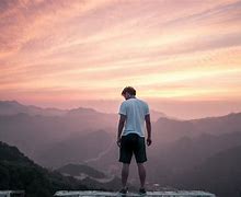 Image result for A Man Climbing a Mountain