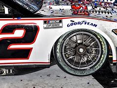 Image result for NASCAR with Wheels On Side