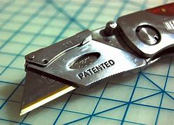 Image result for Automatic Opening Folding Utility Knife