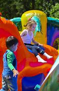 Image result for Children Playing in a Inflatable Playground