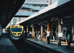 Image result for Car Driving Local Train