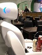 Image result for Service Robot Serving People in a Hotel